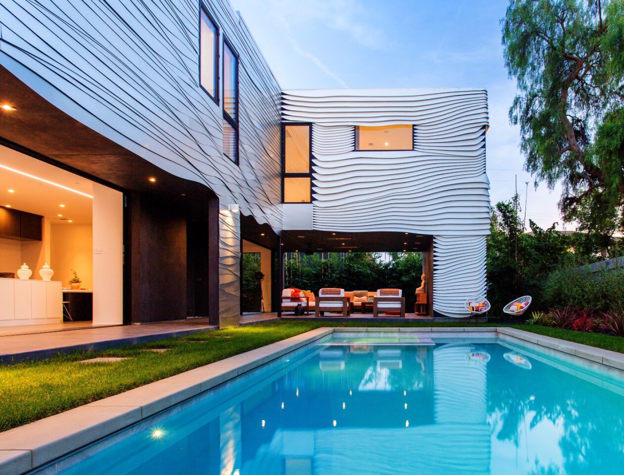 The Wave House boasts an outdoor living room with home cinema