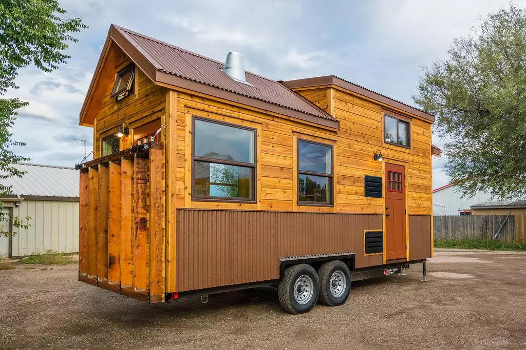 Davis's 22 ft Off-Grid Tiny Home with deck in raised position