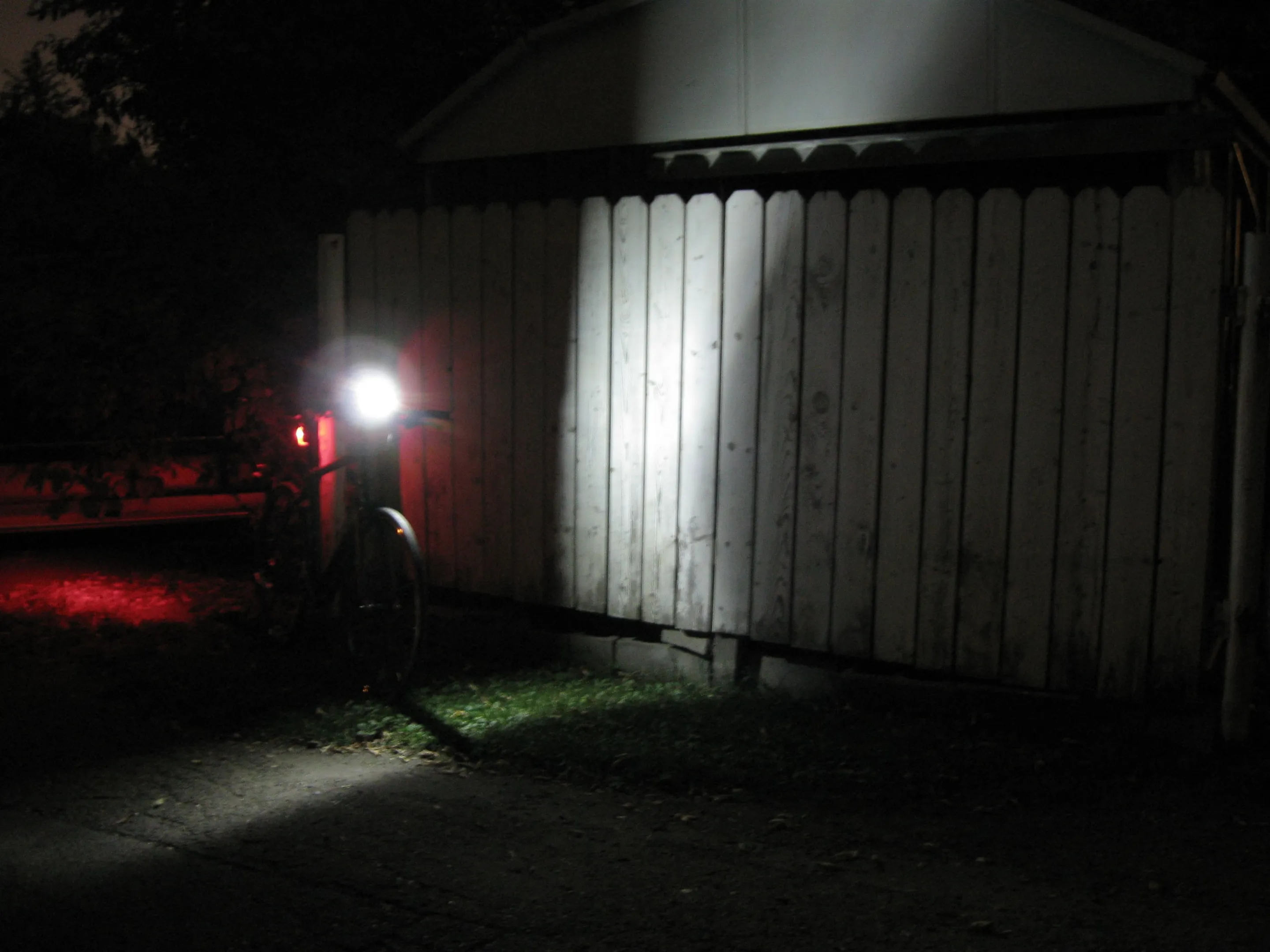 The Defender is highly visible from the front, producing a bar of light on the road perpendicular to the bike's front wheel