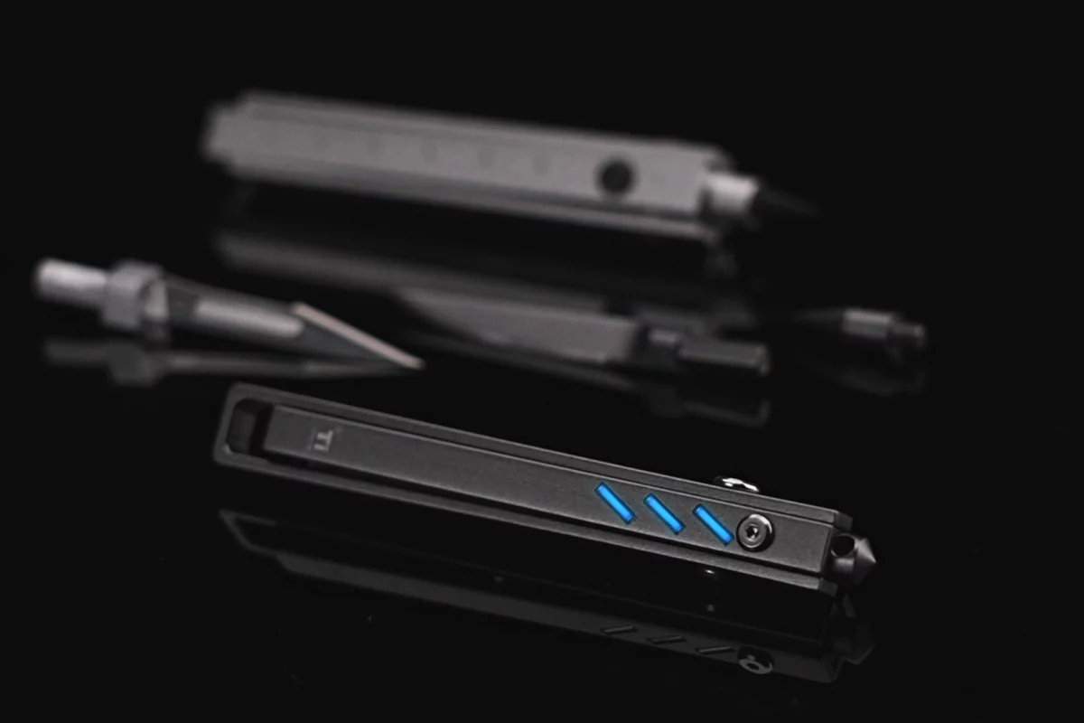 The glowing Ti-One multitool – an EDC tool for crafty, artistic and creative types, including an "eternity pen" and several different craft knife options