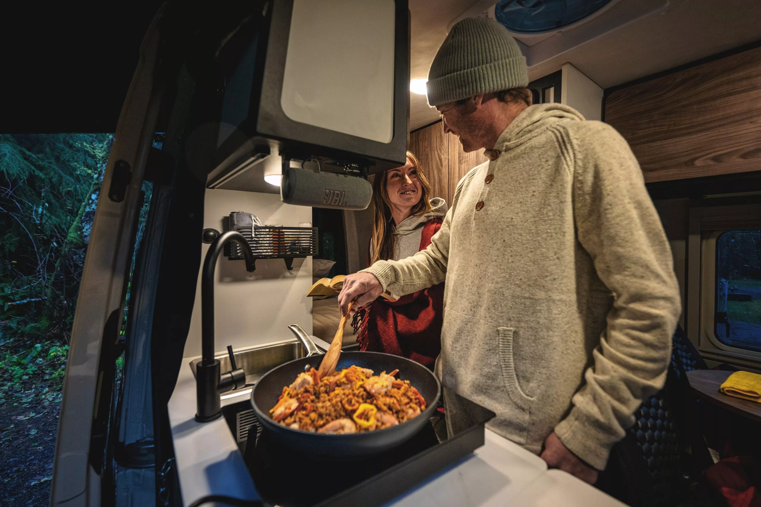 Cooking dinner in the Tiffin GH1 camper van