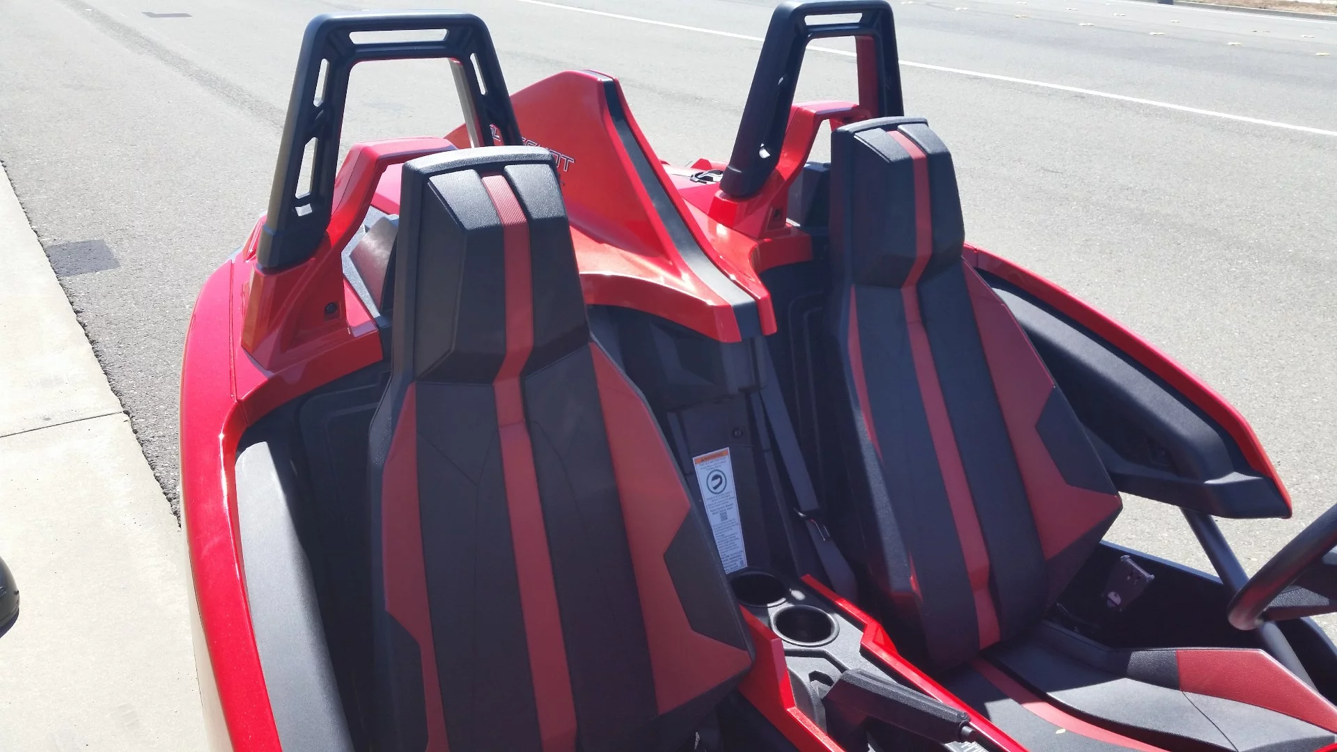 The Slingshot seats do a good job of cradling driver and passenger, and can be easily wiped down when dirty