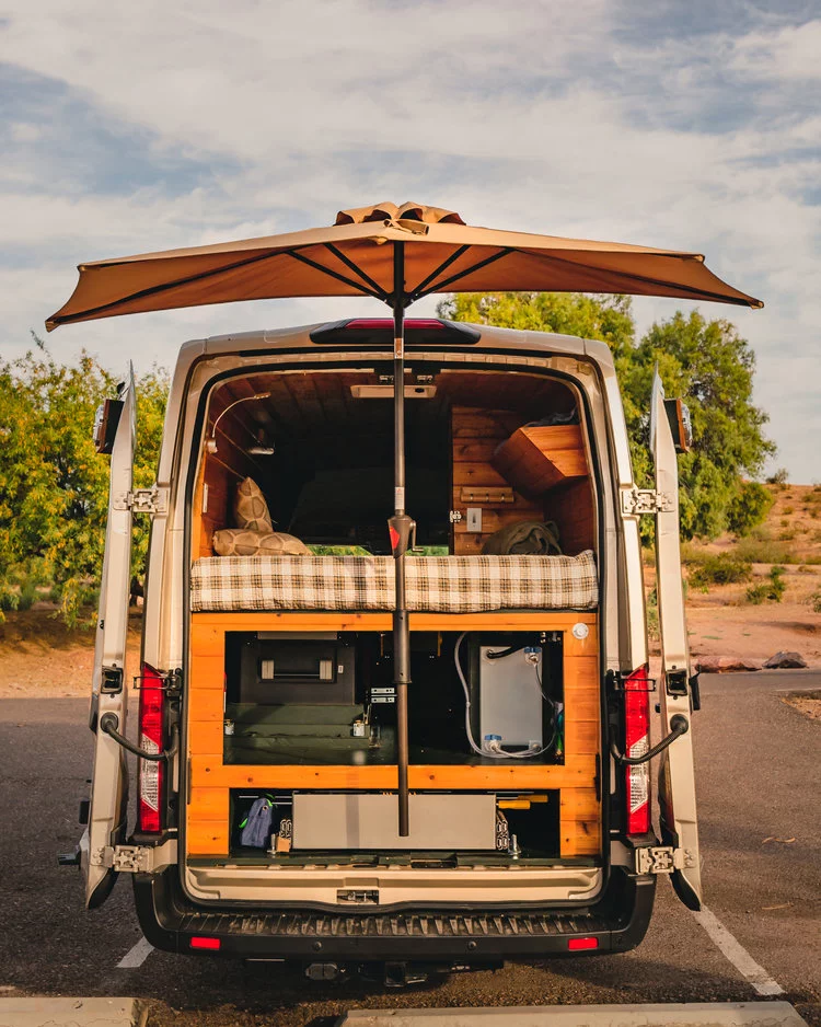 An umbrella holder provides weather protection for kick-off