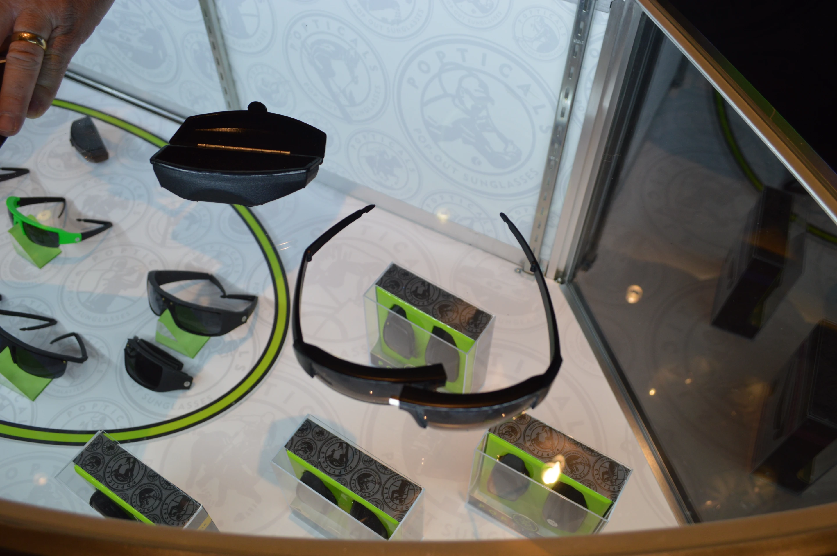 The lenses snap apart but stay connected via metal rails