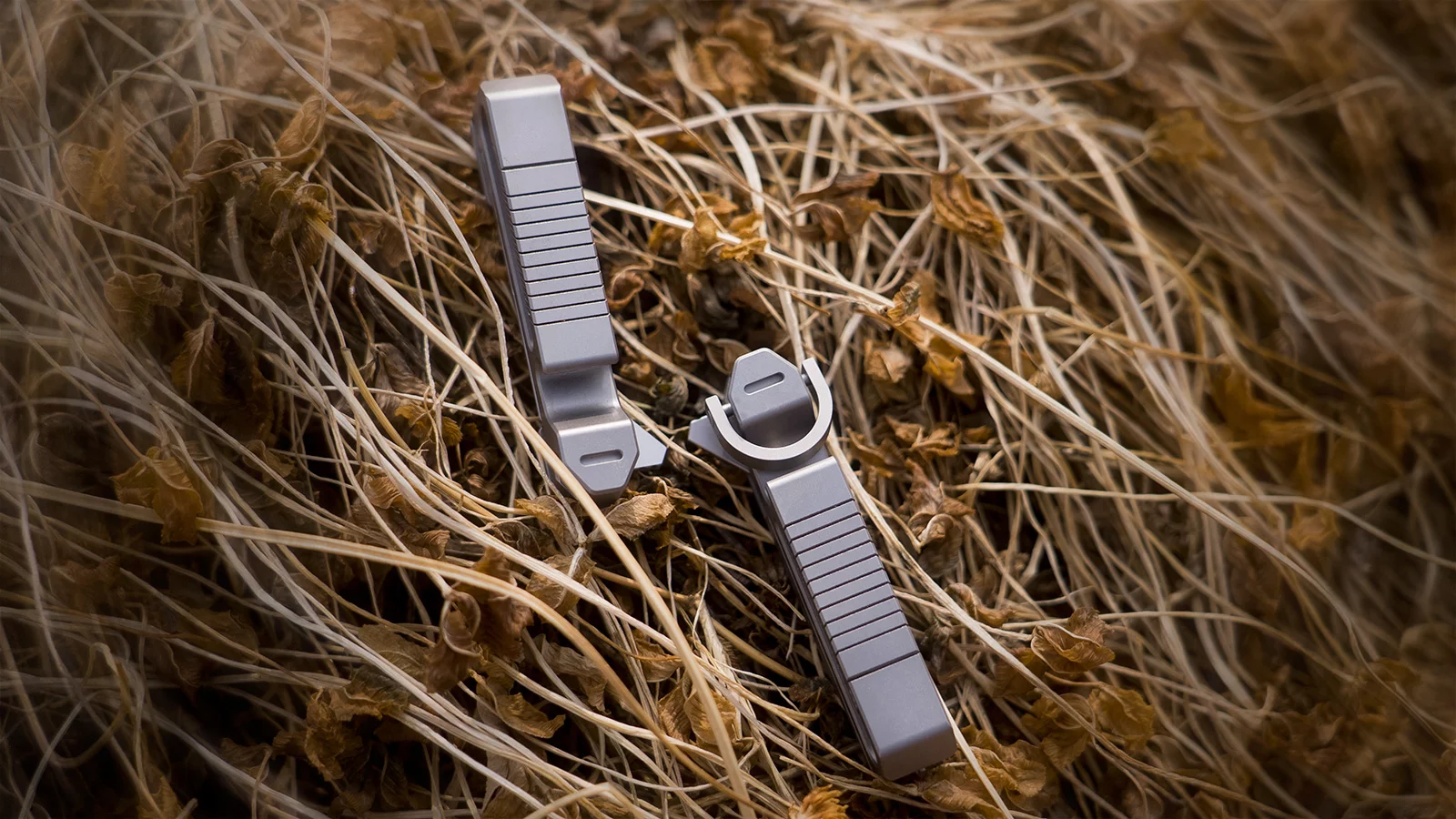 Two Bladeclips displayed on hay