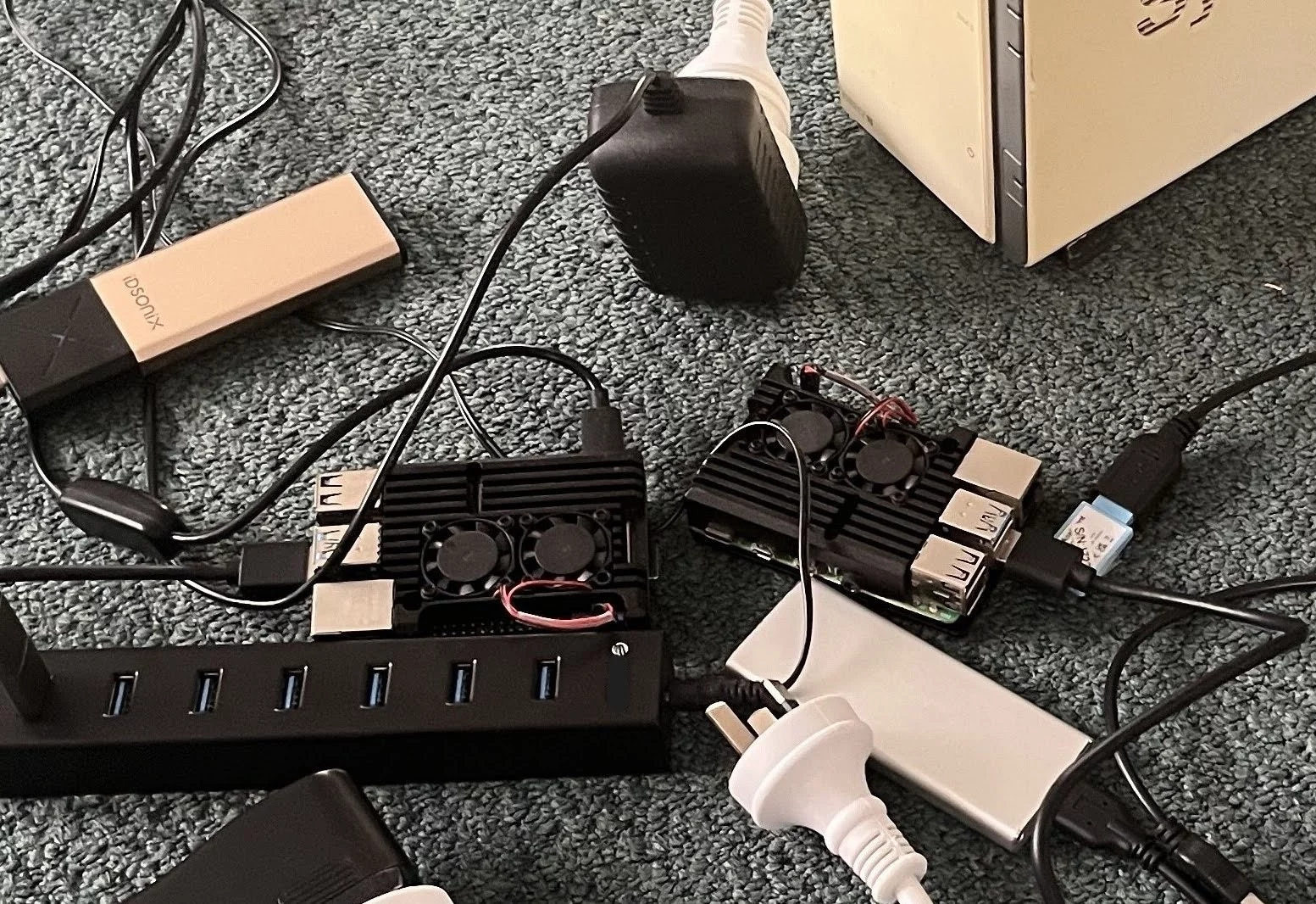 Homelab Mk1 circa 2014. Author's first attempt at digital sovereignty: one Raspberry Pi for Home Assistant, one for Plex, and a NAS full of music.
