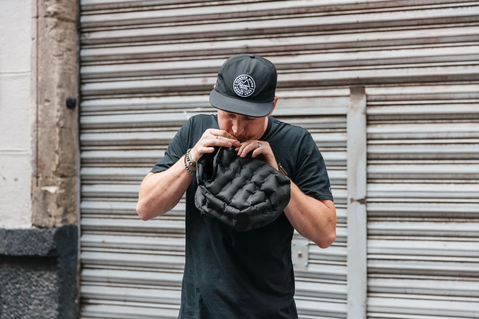 Packable travel bag offers inflatable camera protection