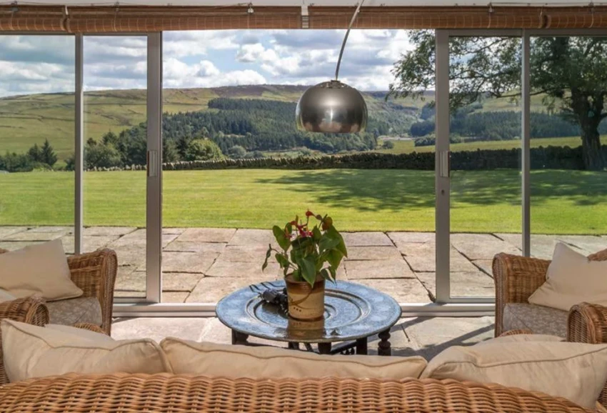 The large glazed doors offer choice views of the nearby Pennine Hills