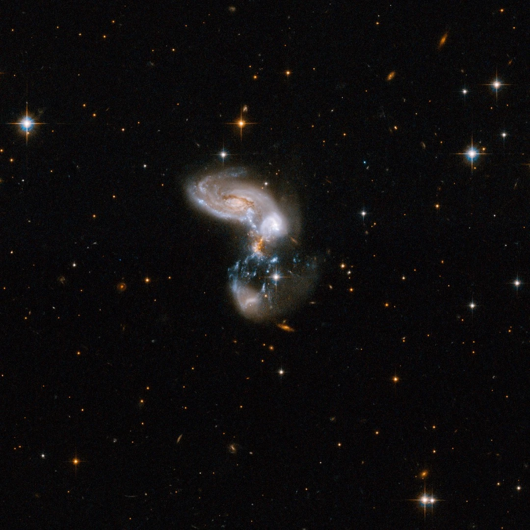 Zw II 96 is located in the constellation of Delphinus, the Dolphin, about 500 million light-years away from Earth