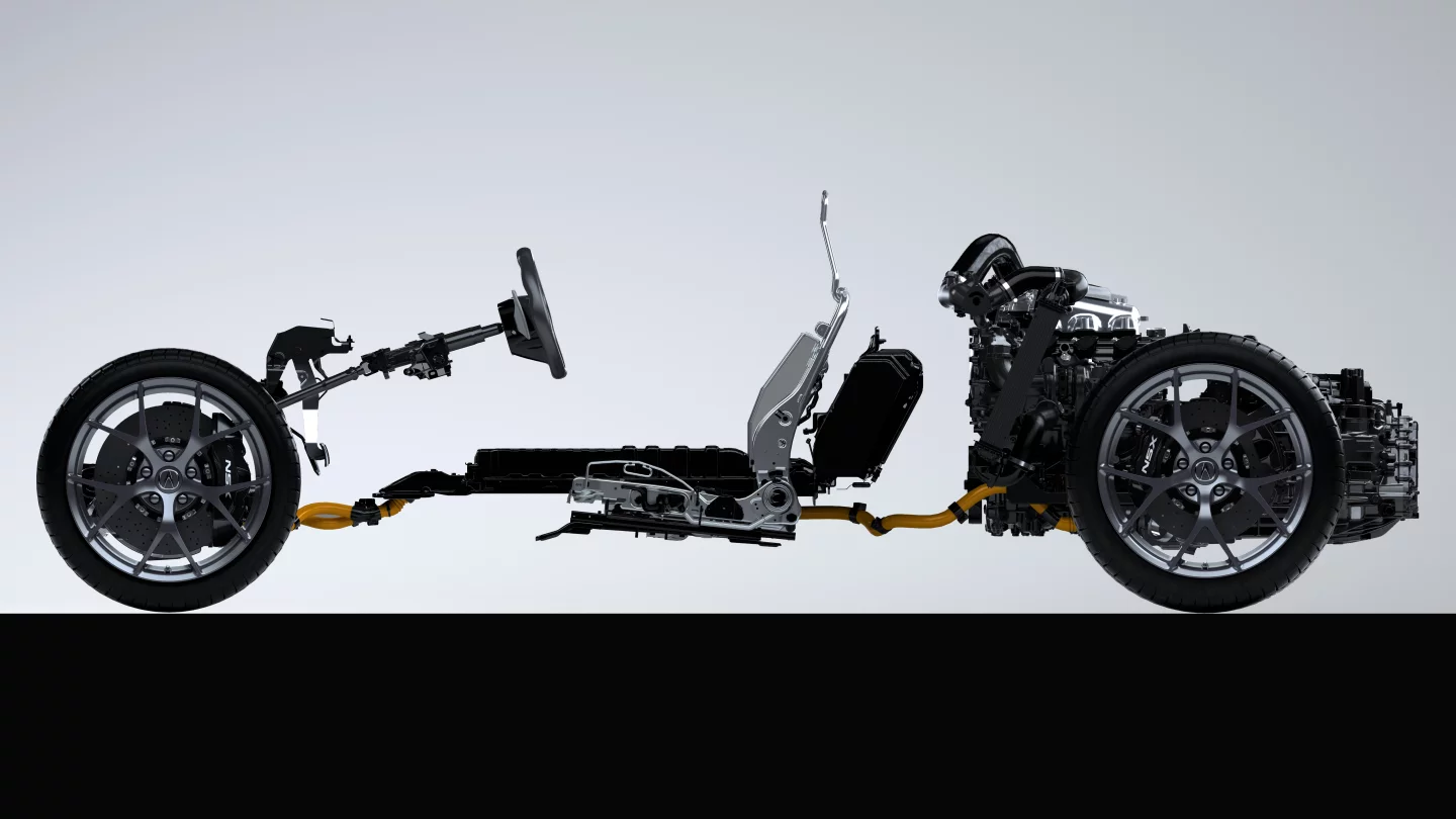 The V6 is mounted longitudinally, centrally and very low in the chassis in an attempt to get the centre of gravity as low as possible (Acura claims the NSX has the lowest center of gravity in its class), and the placement of all powertrain components has been designed to concentrate vehicle mass toward the center of the vehicle. The centre of gravity is just the average position of mass - the closer the mass to that centre of gravity, the better the vehicle's response.