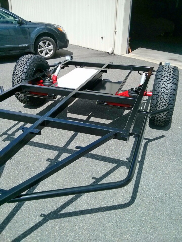 A rectangular tubular steel frame and dual trailing arm suspension help stand up to the terrain