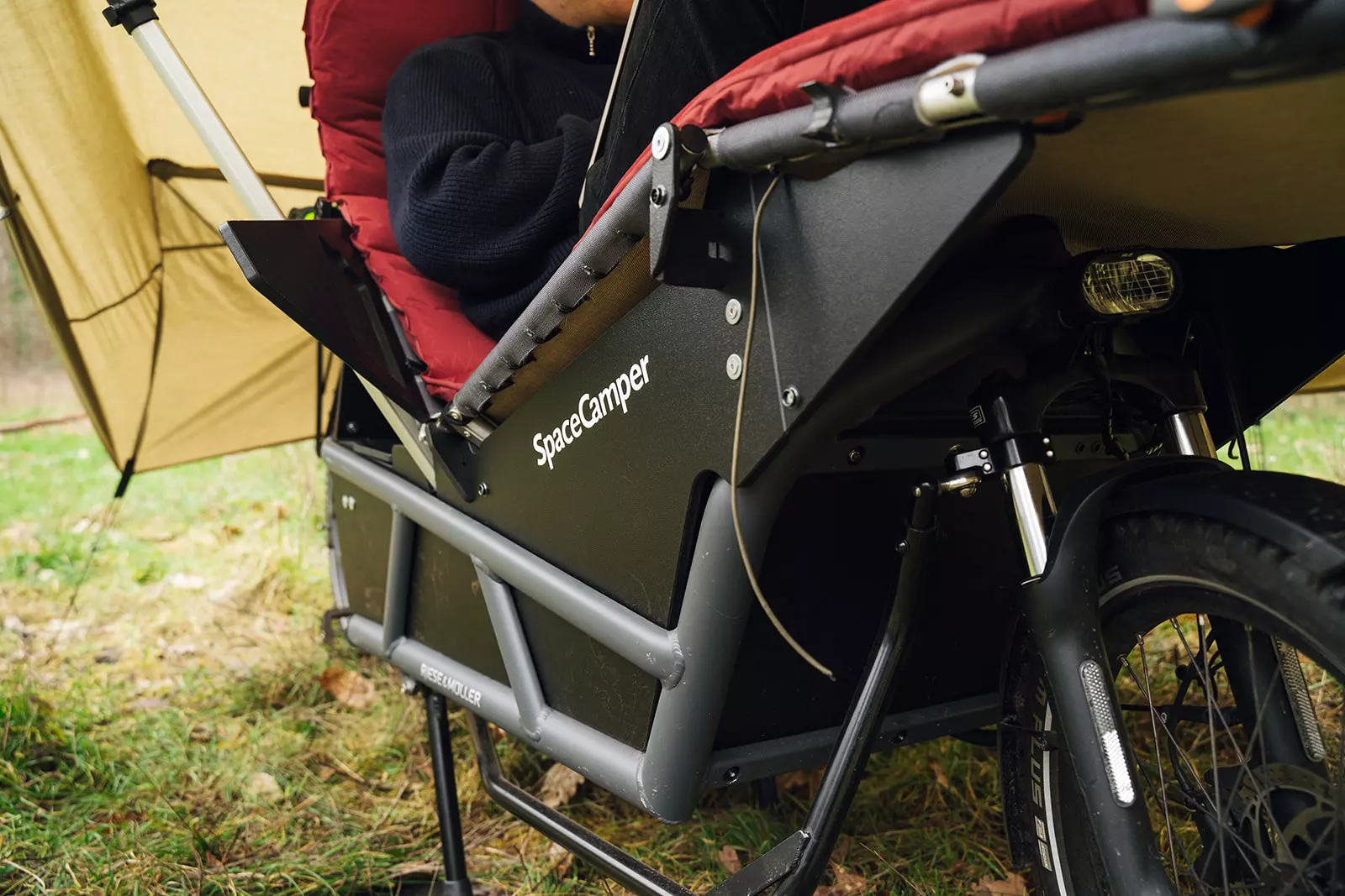 With a folding, reconfigurable frame, the Spacecamper Bike module serves as a cargo box, recliner, desk chair and bed — it also easily removes to leave a standard Riese & Muller Load 75 e-cargo bike