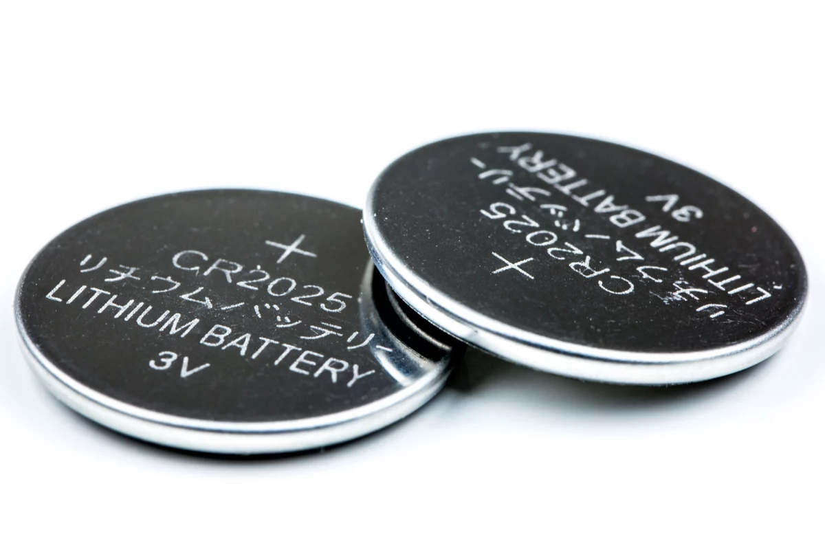Researchers have developed an organic proton battery (not pictured) that is about the size of a button cell battery