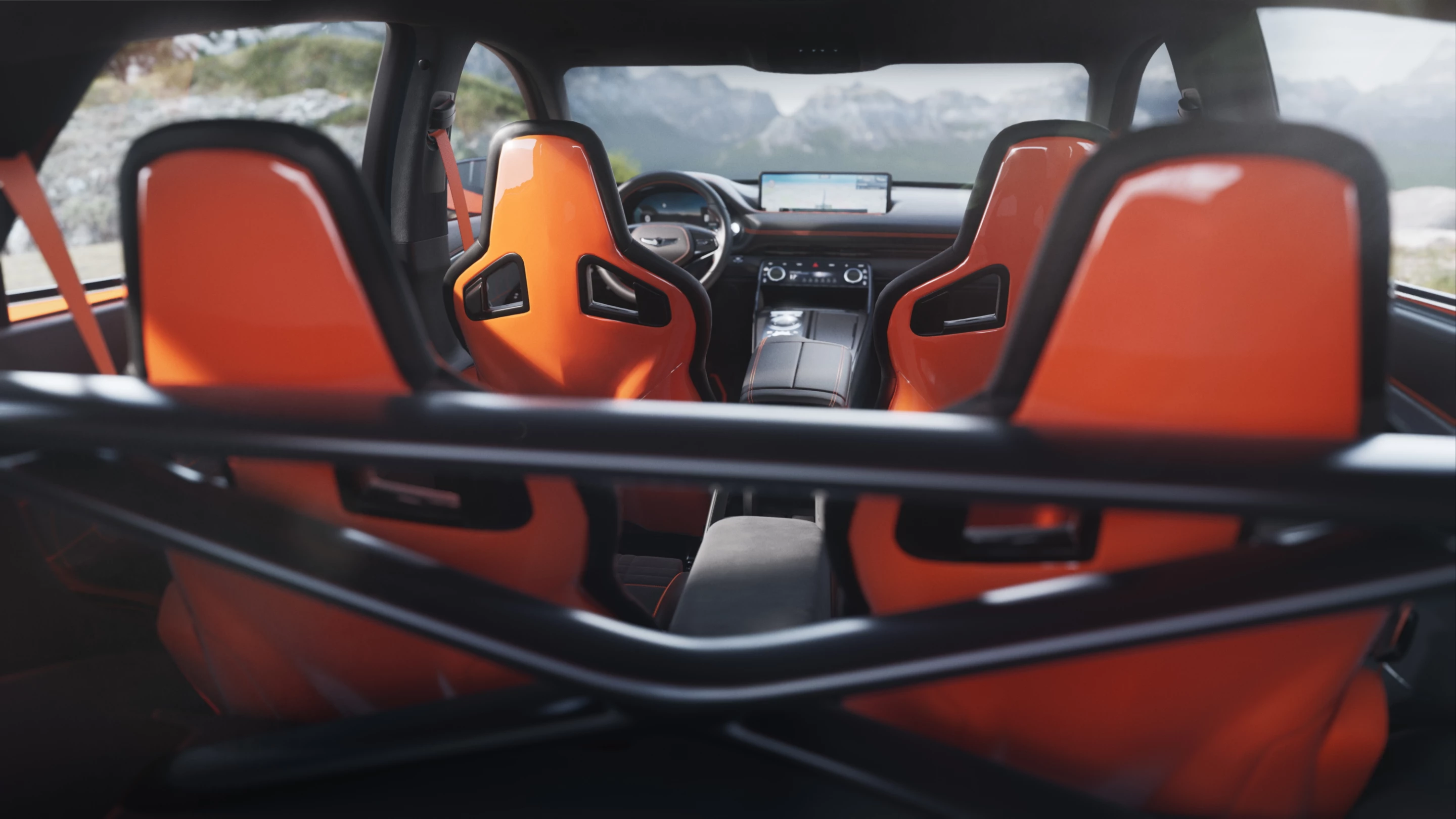 Inside, the GV80 Coupe Concept shows a race-inspired interior with carbon fiber bucket seats and a rear strut brace