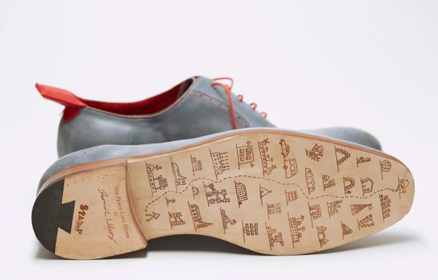 The soles of the bespoke shoes features an illustration etched-on