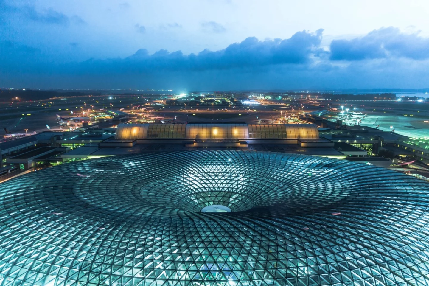 Jewel Changi Airport's glass-and-steel structure spans over 200 m (650 ft) at the roof's widest point