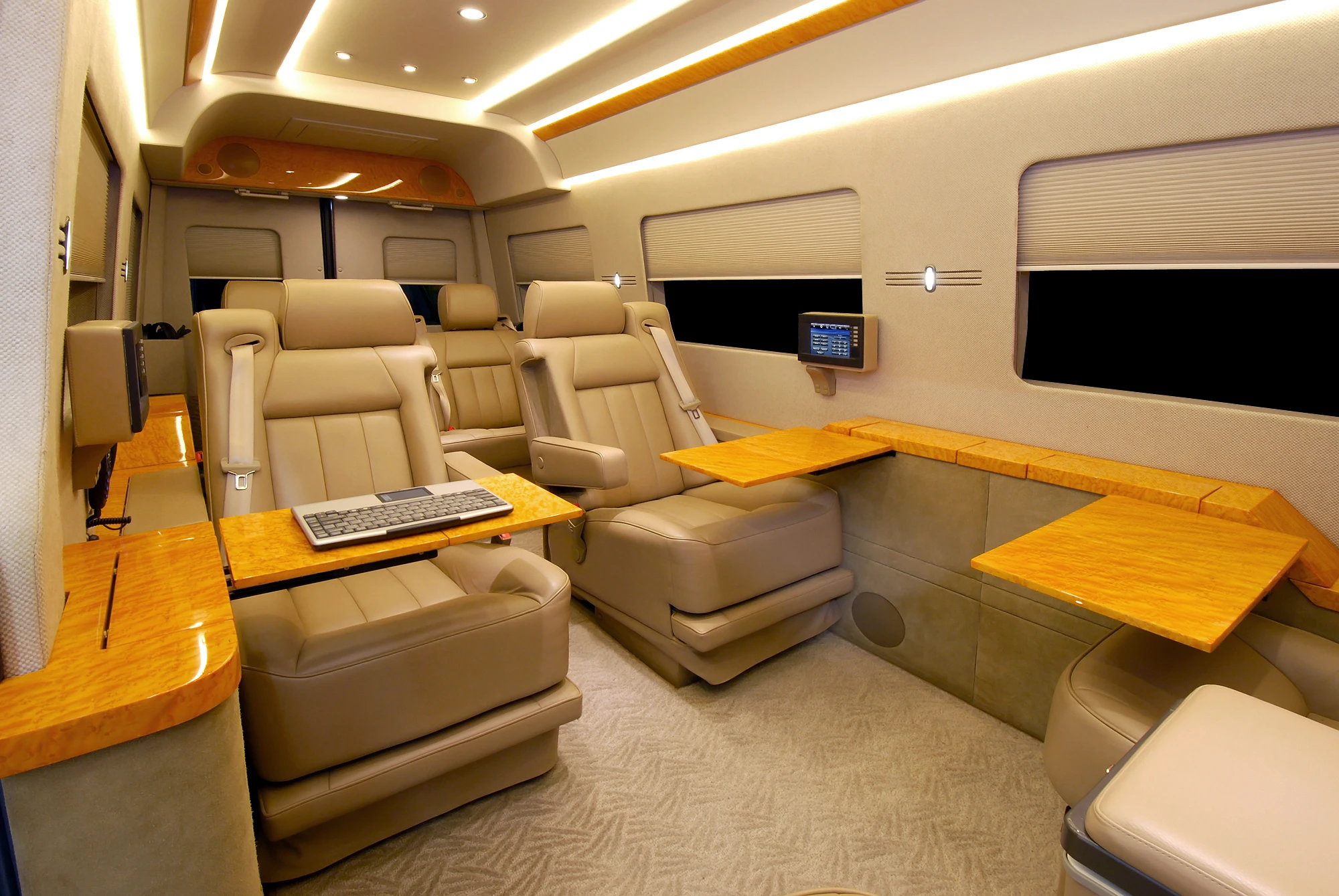 An on-board computer and series of desk tops allow passengers to keep up with work