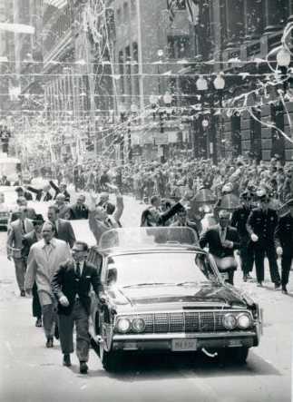 The same car being used in a ticker tape parade for astronauts