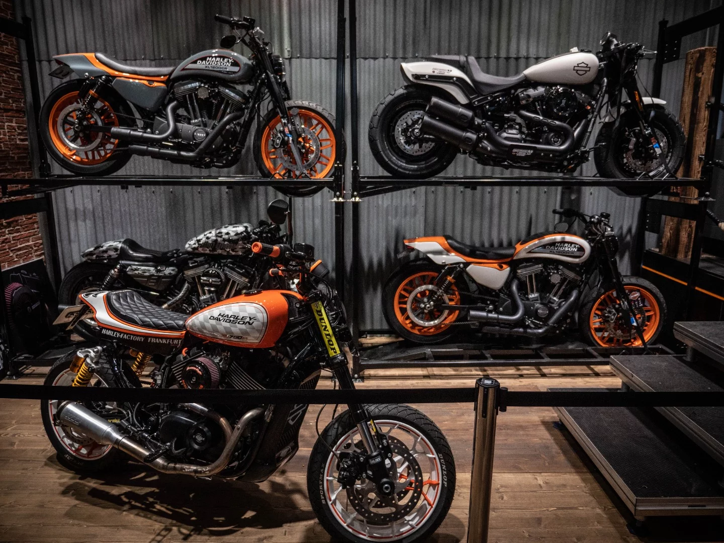 Custom bikes at the back of the Harley-Davidson stand