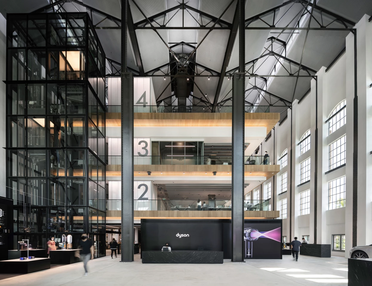 Dyson, Global Headquarters, Singapore was designed by M Moser Associates. The project repurposed a 100-year-old power station into Dyson's new global HQ, with the four-story high Turbine Hall at its heart. The project won the Interior Design of the Year prize in the 2022 Architecture MasterPrize