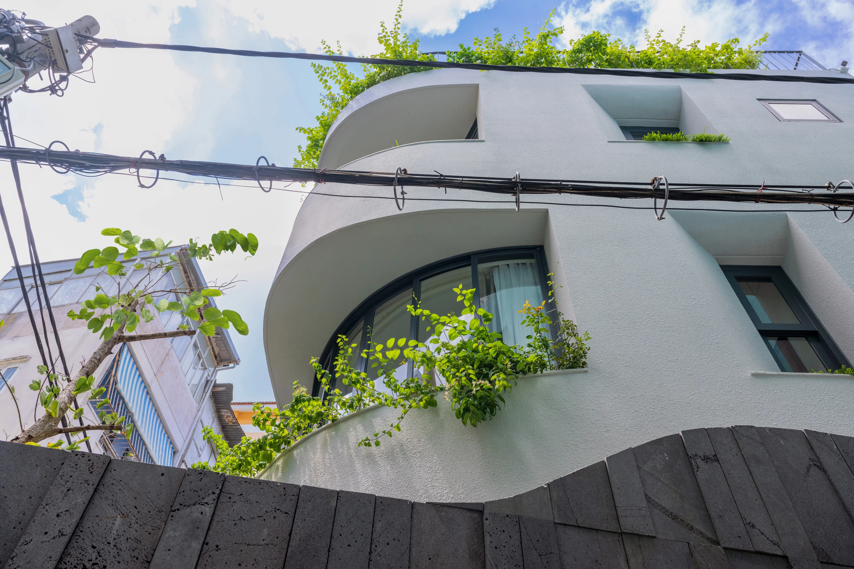 The Secret Garden consists of four floors and is home to a family of four