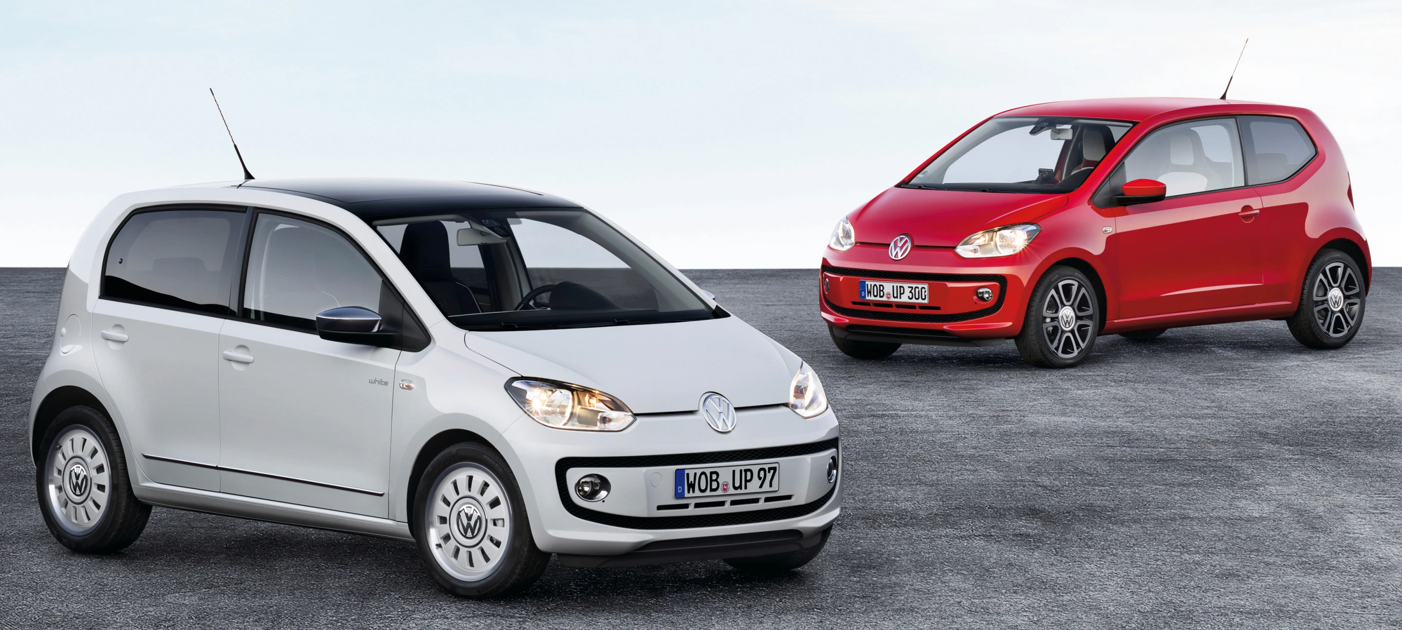 The new five-door up! (front) and the two-door model