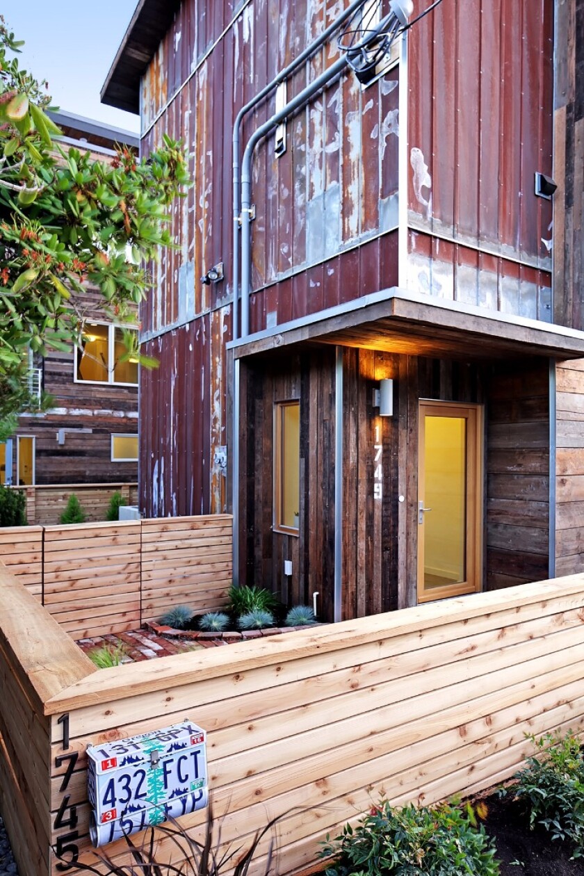 The building's exterior paneling is reclaimed Douglas Fir
