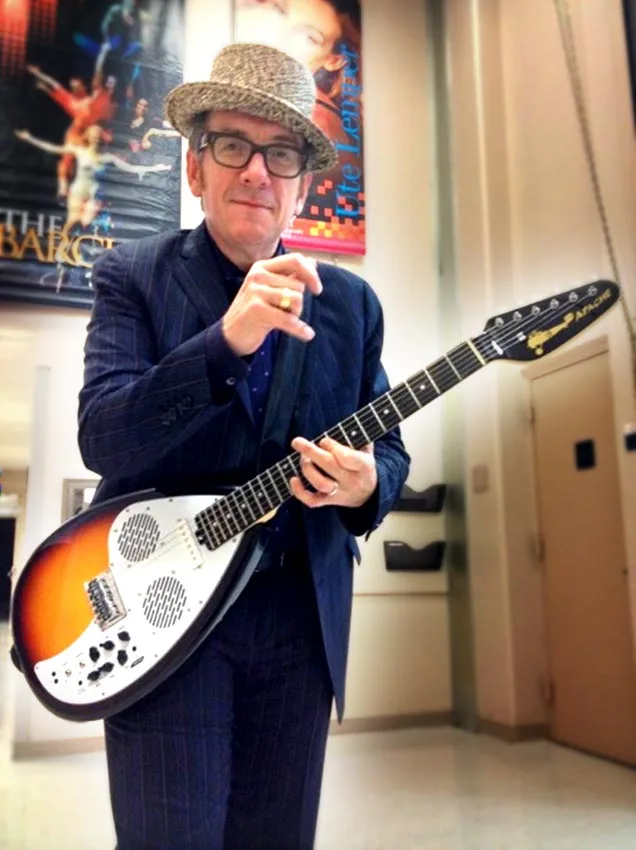 Elvis Costello was recently presented with a six-string Apache travel guitar