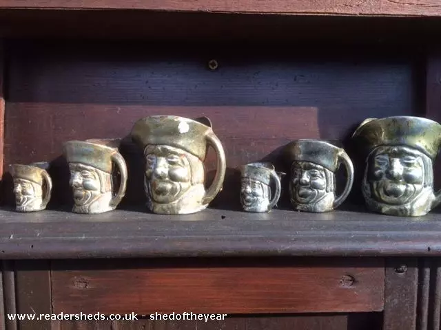 The village is a cluster of sheds that includes mini theater/house, a pub made mostly from old harmoniums, and more