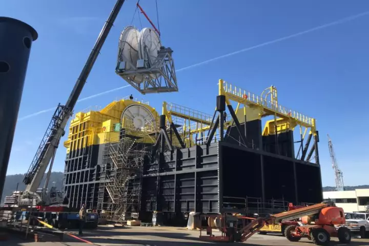 This massive OE35 wave energy generator was built in an Oregon shipyard and towed out to Hawaii for testing