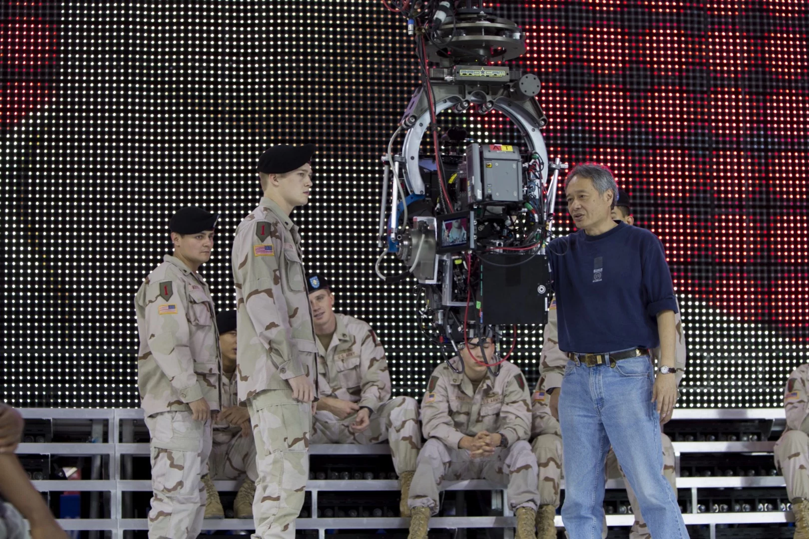 Ang Lee (right) directing Joe Alwyn (left) on the set of Billy Lynn's Long Halftime Walk