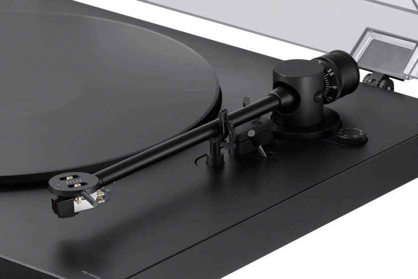 The tonearm has a low resonance head and moving magnet cartridge containing a centrally-located stylus