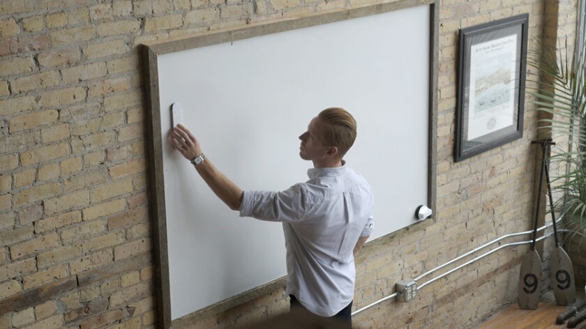The Equil Smartmarker uses a sensor that attaches to a whiteboard surface to detect the movements of the Smartmerker sleeve
