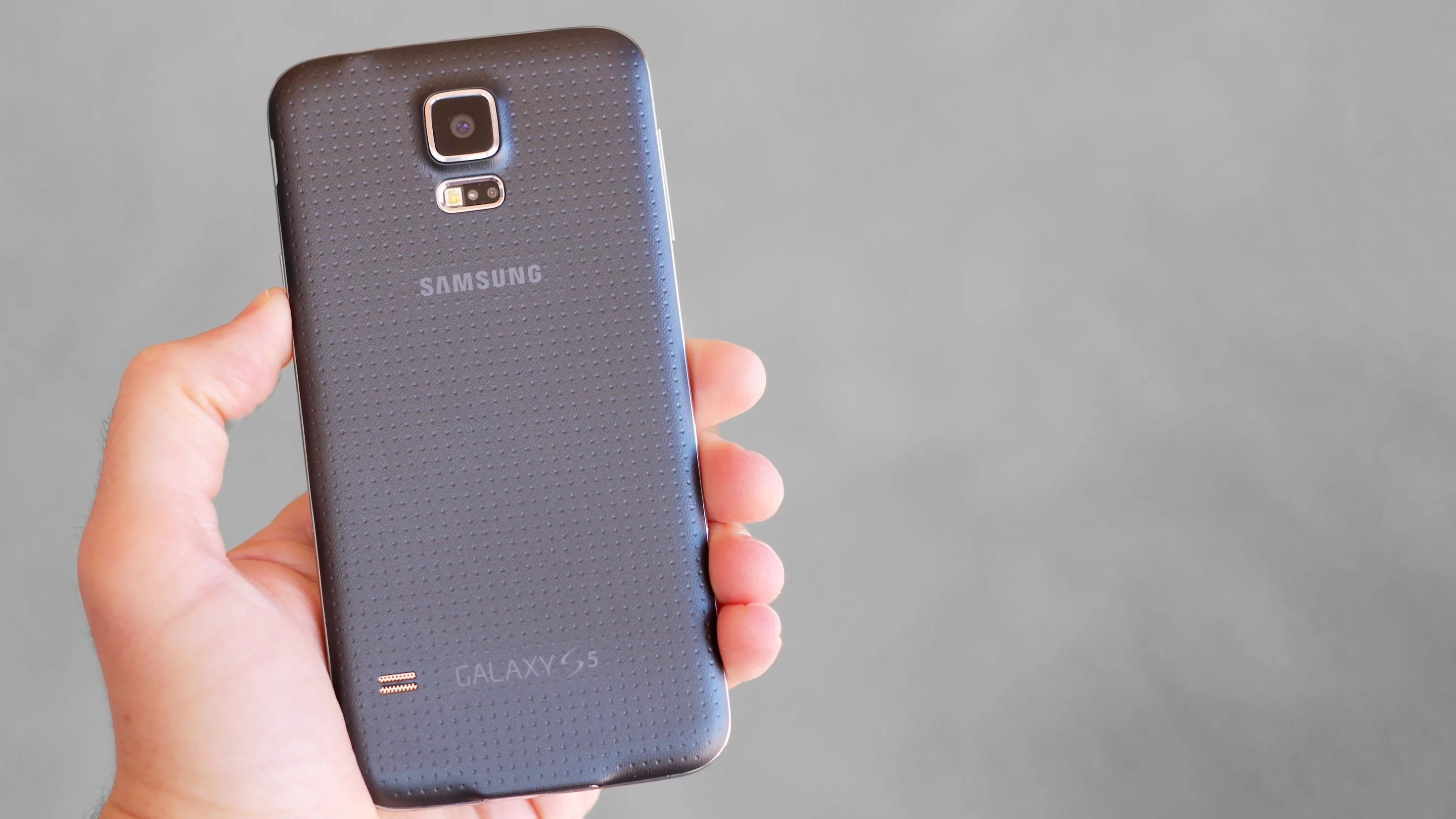 The Galaxy S5's dimpled pleather backing sounds cheesy, but it's also very comfortable to hold