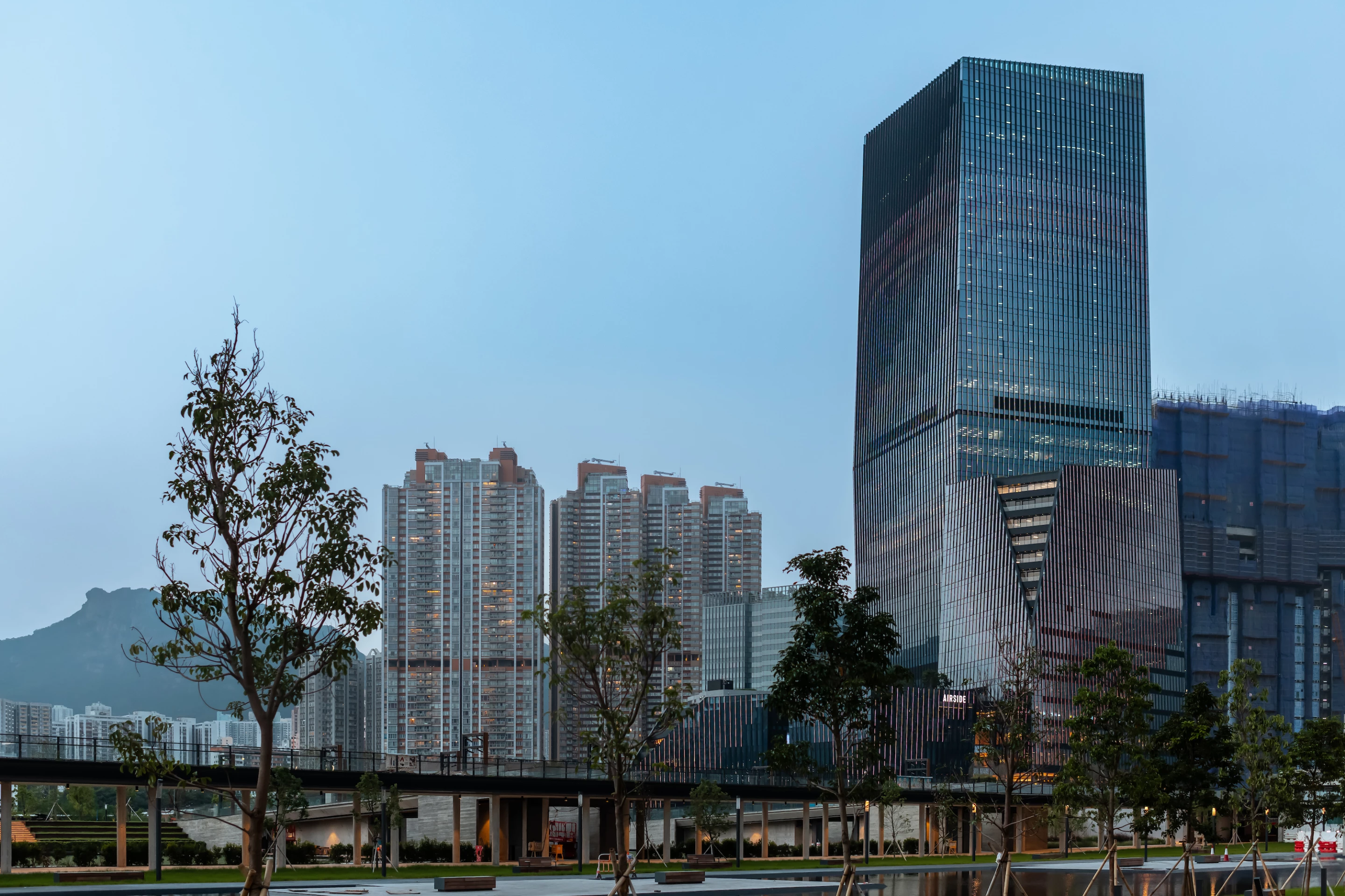 Airside consists of five interconnected volumes that gradually step up from a nearby river and culminate in the tower, which rises to a height of 213 m (almost 700 ft)