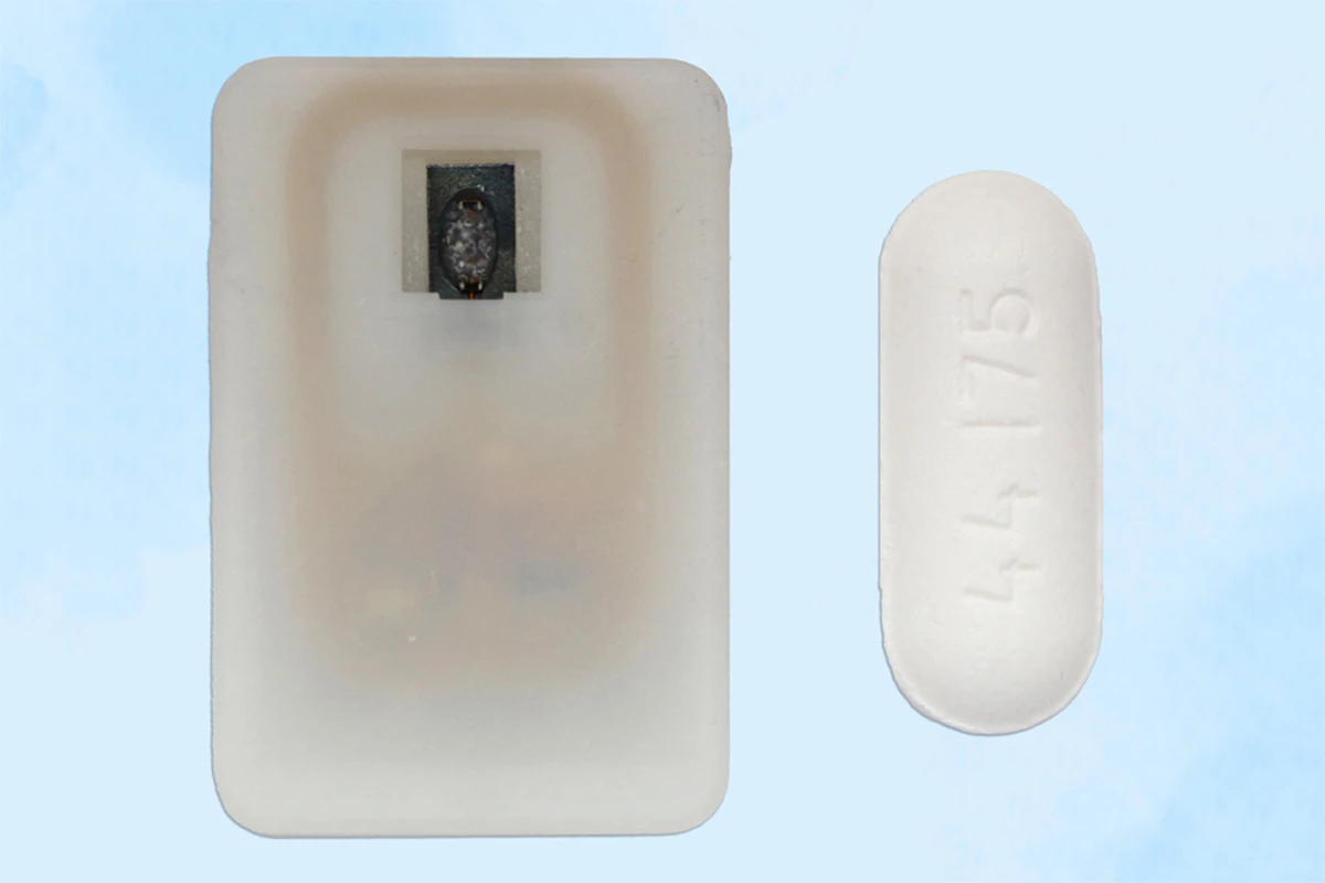 The implant is about the size of a quarter and only weighs 2 g