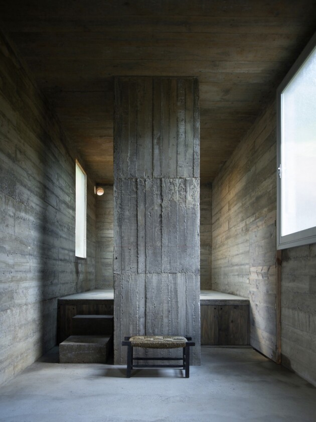 The interior of Loba House is divided by large concrete columns