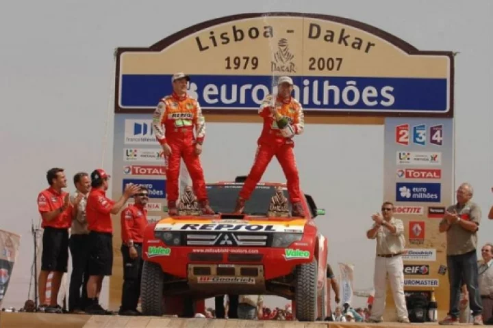 Stephane Peterhansel and Jean-Paul Cottret celebrate their victory in the 2007 Dakar Rally.