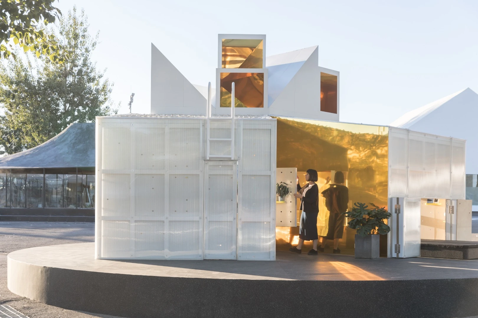 The Mini Living Urban Cabin Beijing has a surface area of 15 m sq (161 ft) and fits a living and sleeping sections on one side of the communal space, and a kitchen and bathroom on the other