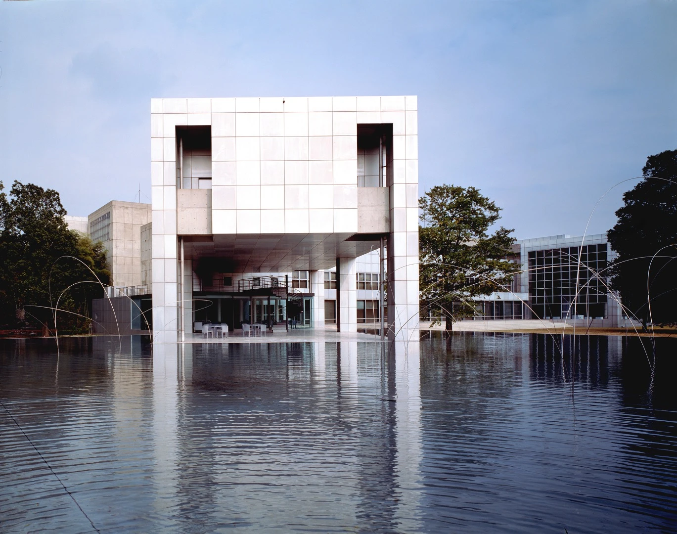 The Museum of Modern Art, Gunma, comprises a system of cubes that form a primary rectangular backbone with two projecting wings