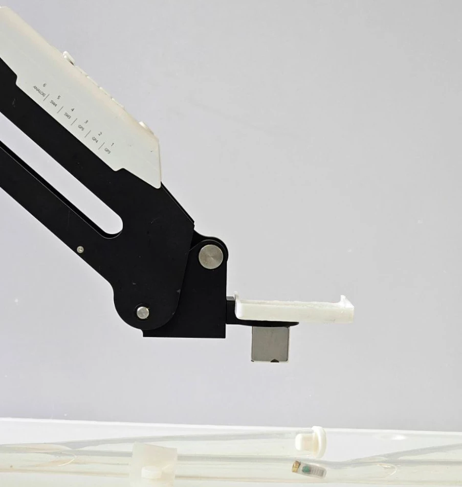 MEDS alongside the robotic arm that's used to guide it