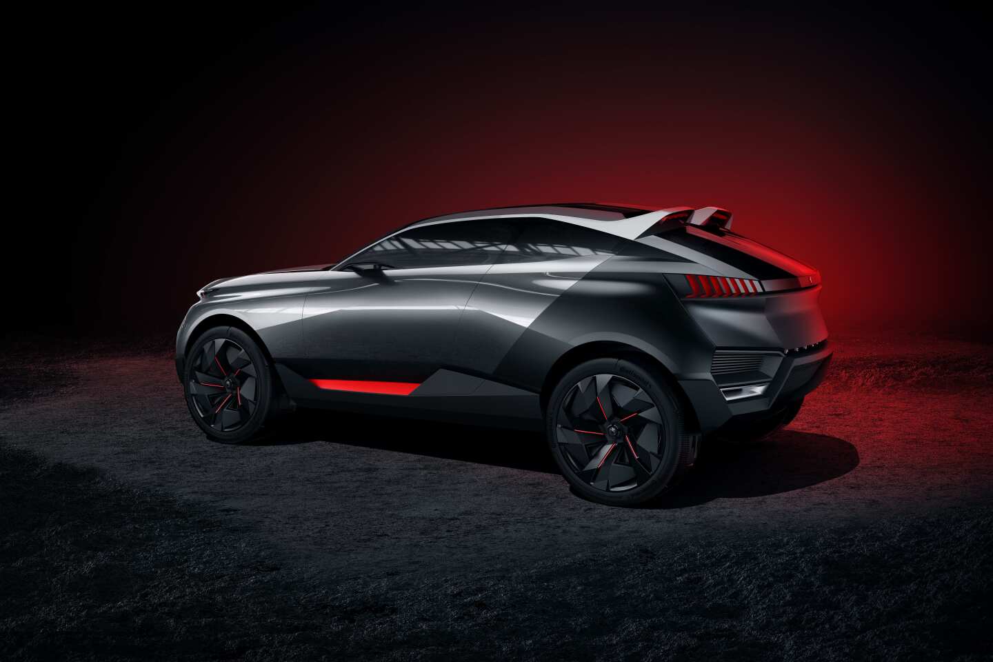 The matte black of the rear wings aligns with the roof spoilers