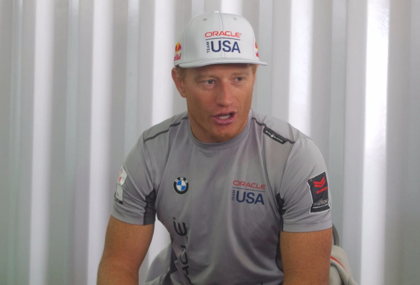 Oracle Team USA skipper Jimmy Spithill chatting with press at Oracle Team USA's canteen in Bermuda