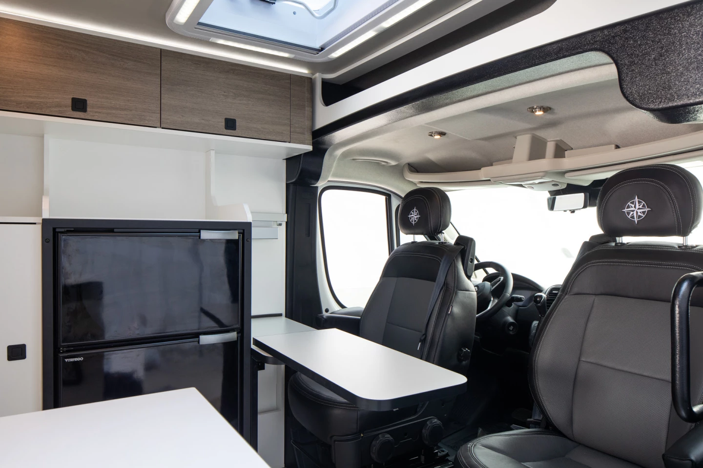 Without the need to serve four people, the Wave For 2 uses a slim slide-away table for two