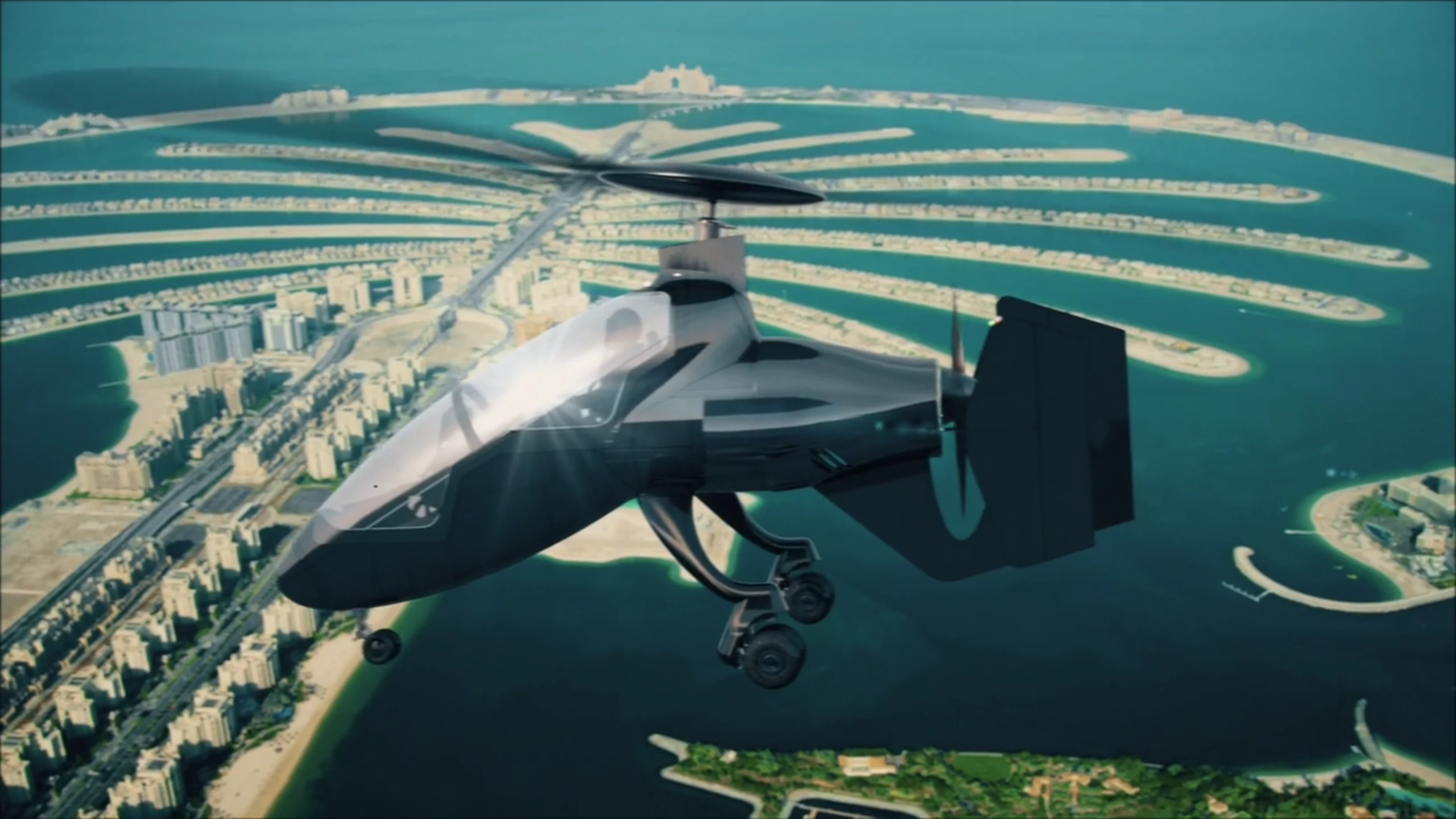 A free-spinning top rotor provides lift, and a rear pusher prop gives the gyrodyne forward motion. The top rotor can be powered for VTOL operations.