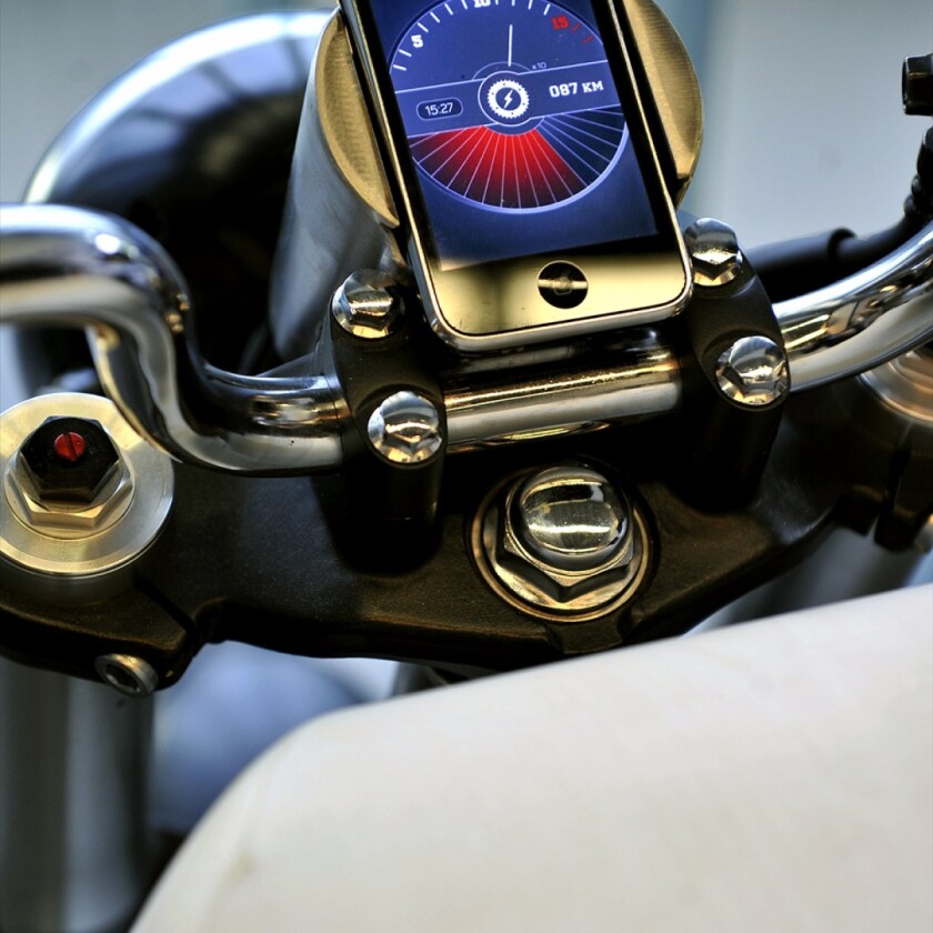 Martin Hulin's e-Raw electric motorcycle: dash unit is actually your iPhone in a cradle. Not sure how this holds up in bad weather