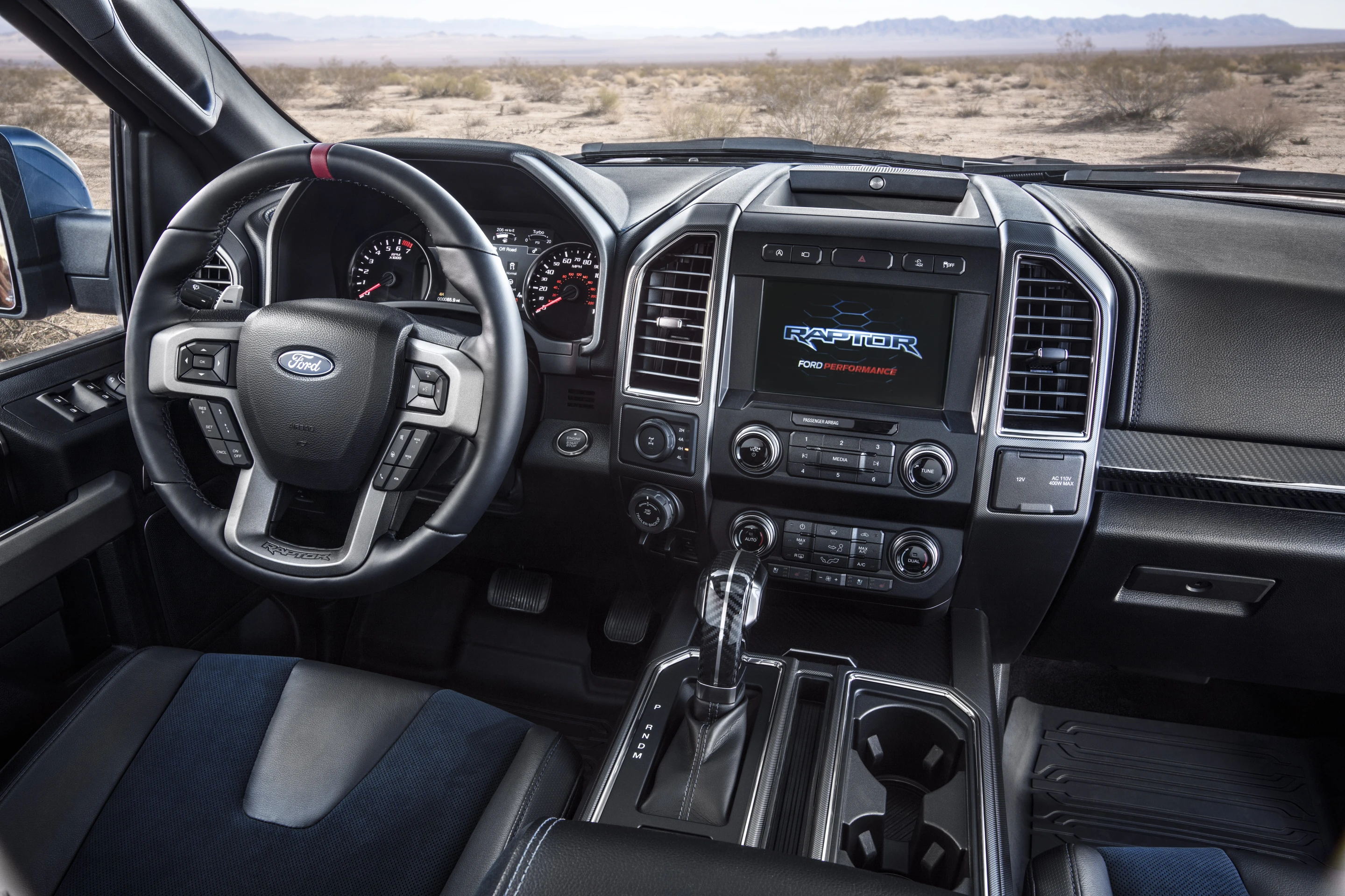 The interior of the 2019 Ford F-150 Raptor is very similar to other F-150 interiors, with a few sport trim upgrades