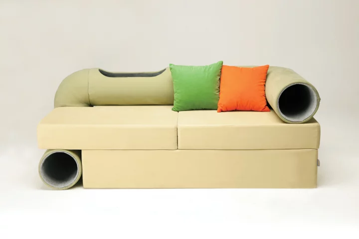 The Cat Tunnel Sofa features a play tunnel that runs along the arm, back and side of the sofa