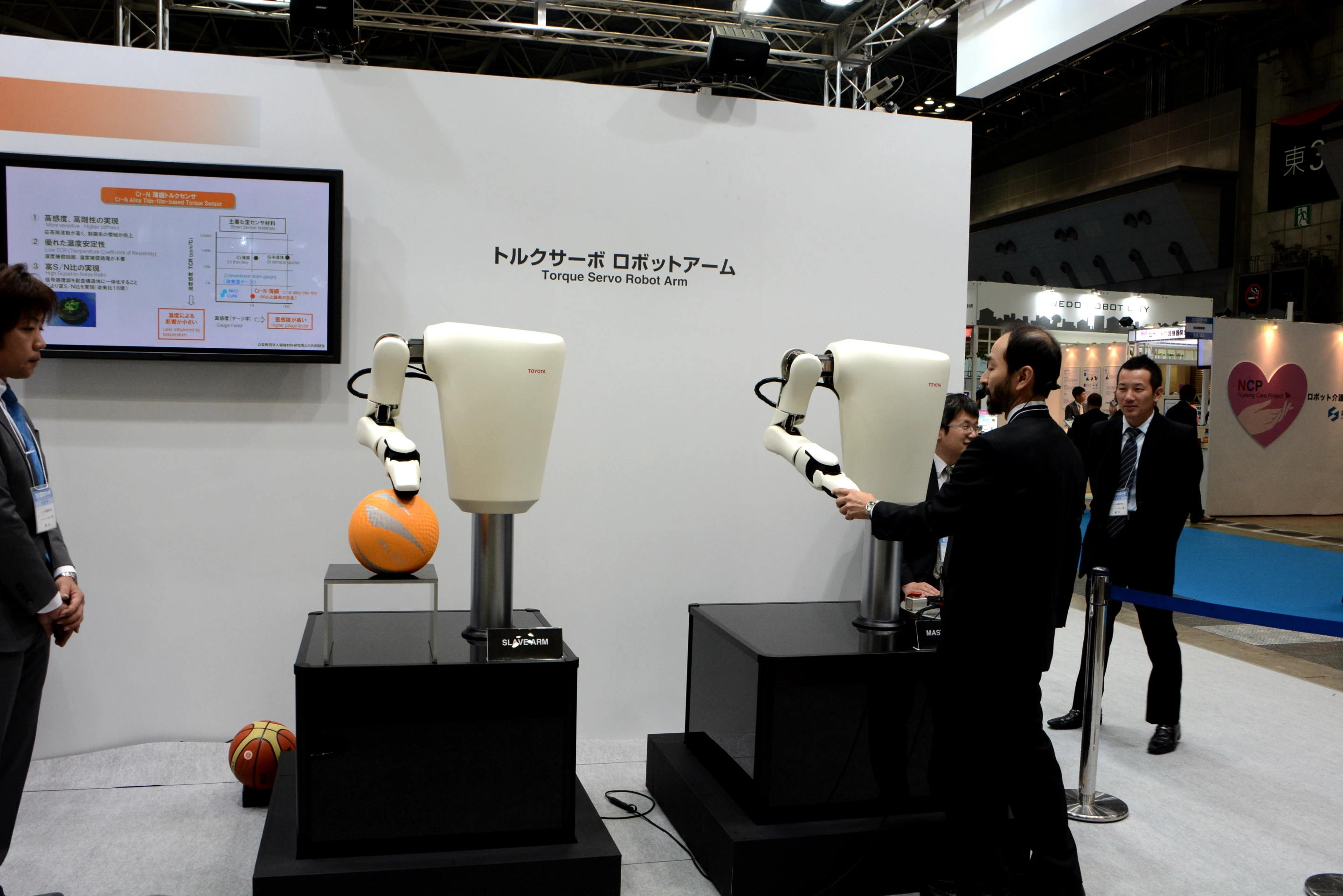 Toyota showcased its new torque servo module in a pair of compliant robot arms (Photo: Mike Hanlon, Gizmag)