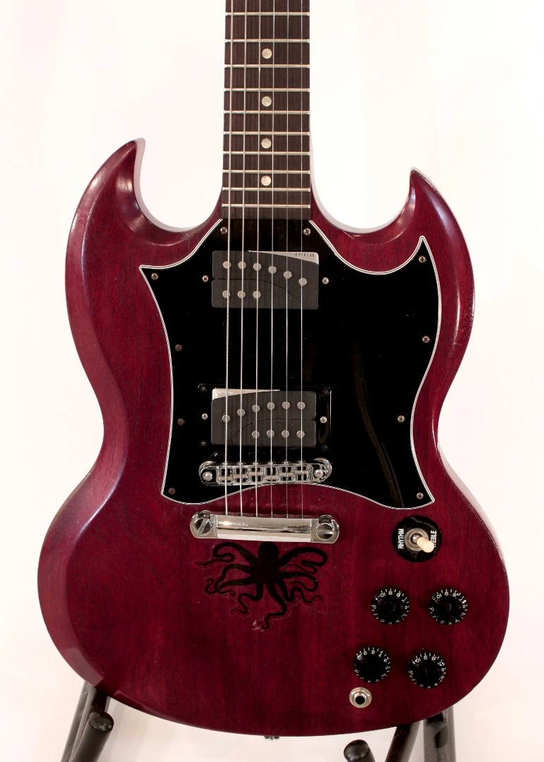 A Gibson SG sporting a pair of Rivet pickups